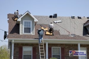 roofers replace storm damaged roof