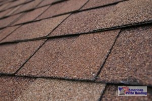 close up of brown asphalt shingle