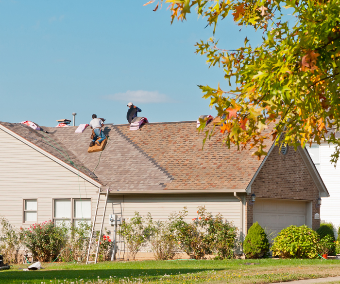 roofing contractors on roof