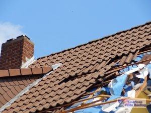 storm damaged tile roof