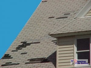 shingles missing on roof from wind damage